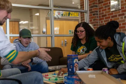 students playing a board game