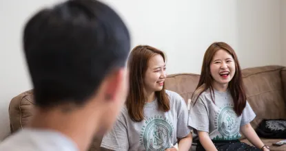 International Students Laughing On Campus